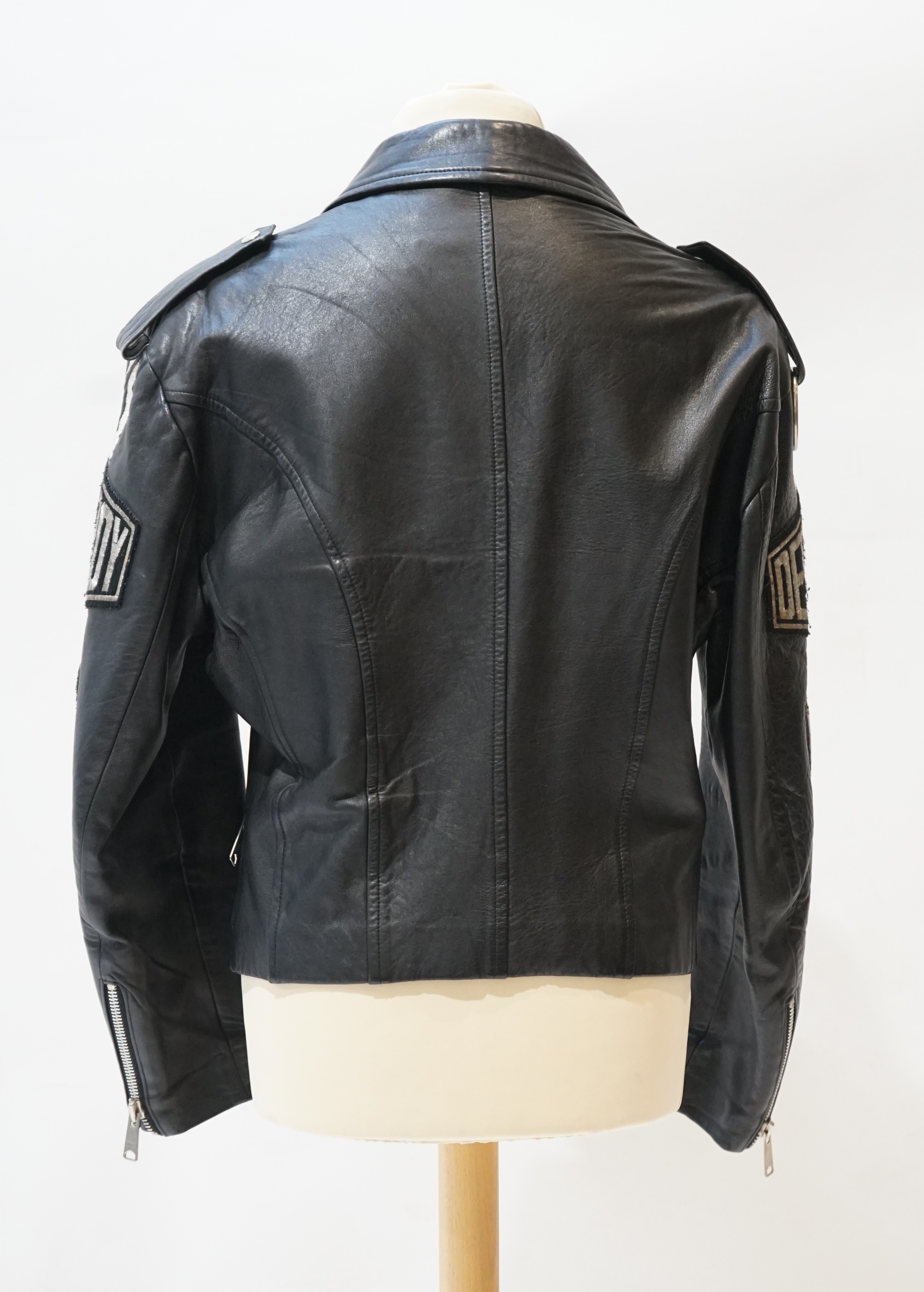 A gentleman's John Richmond black leather biker jacket with 'Destroy' embroidered arms, size L